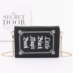 Chic Black Magic Book Clutch‎